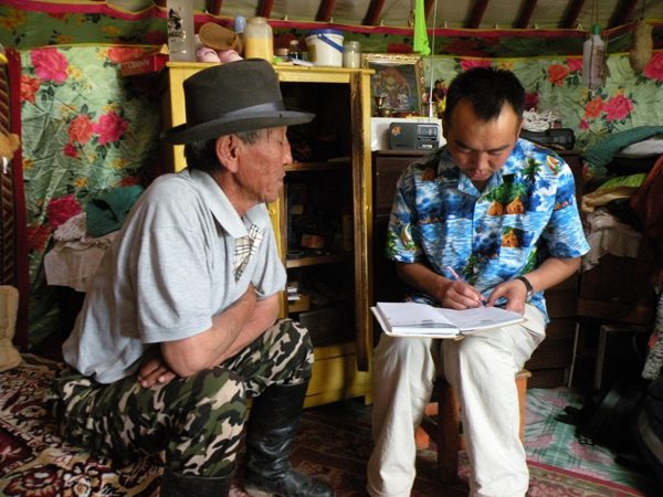 Interviewing a Mongolian pastoralist