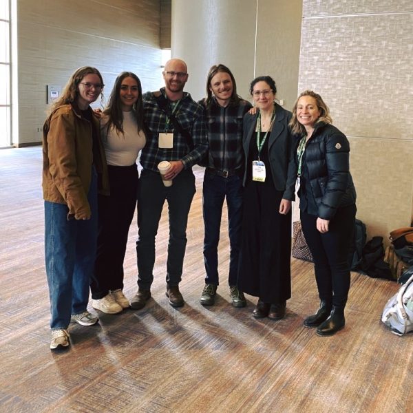 Students Stina Berthold, Sydney Holden, doctoral candidate Patrick Ryan, student Eliot Hutchinson, doctoral candidate Zoey Walder-Hoge and Associate professor Heidi Hausermann at the 2023 American Association of Geographers annual meeting in Denver, March 2023