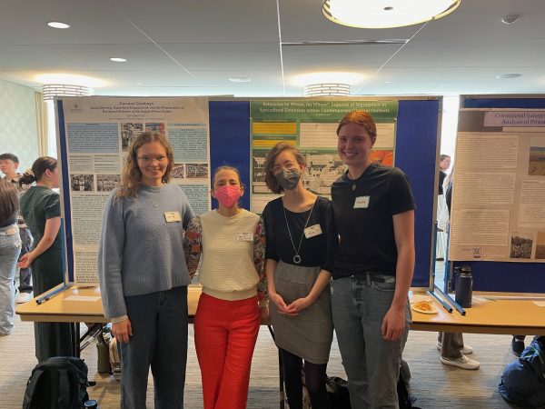 Student Stina Berthold, Assistant Professor Carrie Chennault, students Kira Dickerson and Maddie Stott at the Spring 2023 ANTH/GR Capstone Poster Symposium