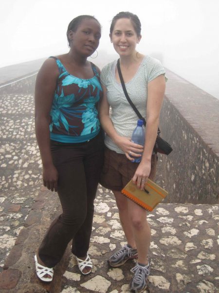 Two women standing on stone jetty at the Citadel in Haiti