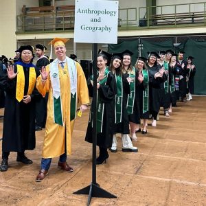Fall 2023 graduating Anthropology and Geography students, with Assistant Professor Andrew Du (left),  at Commencement, December 16, 2023.