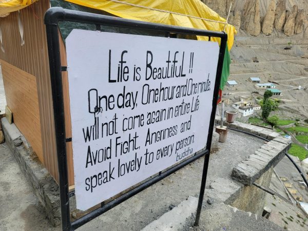 A sign, seen near Buddhist temple while traveling in India.