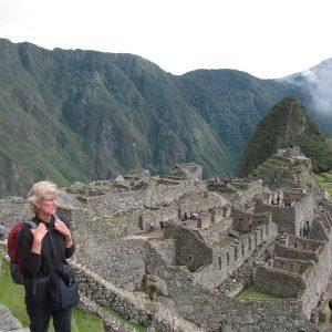 Professor standing above site at Machu Picchu, Peru
