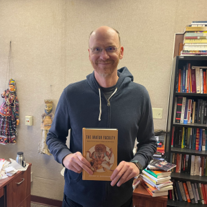 Jeffrey Snodgrass with his 2023 book, The Avatar Faculty