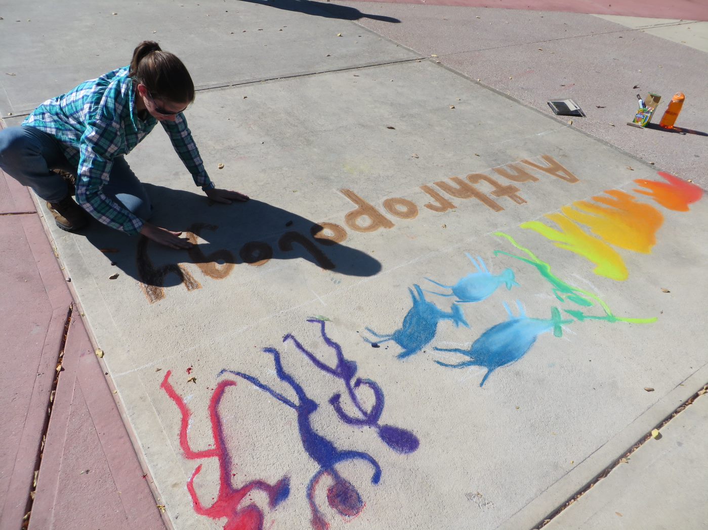 Colorful Anthropology chalk-artwork on the CSU plaza