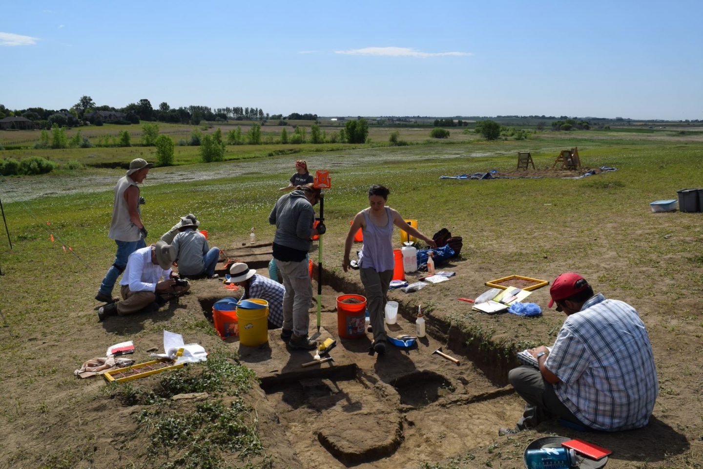 Various people working at a digsite